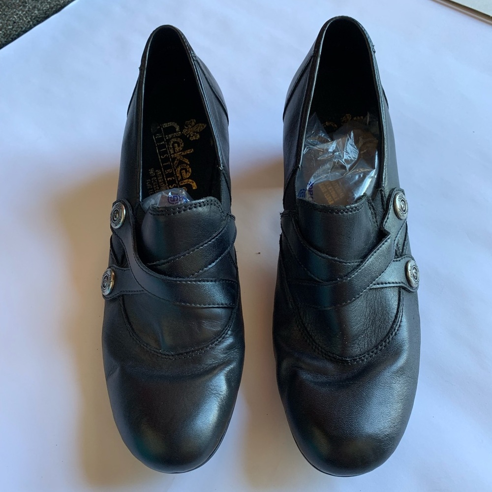 Black leather low heel Rieker antistress shoes